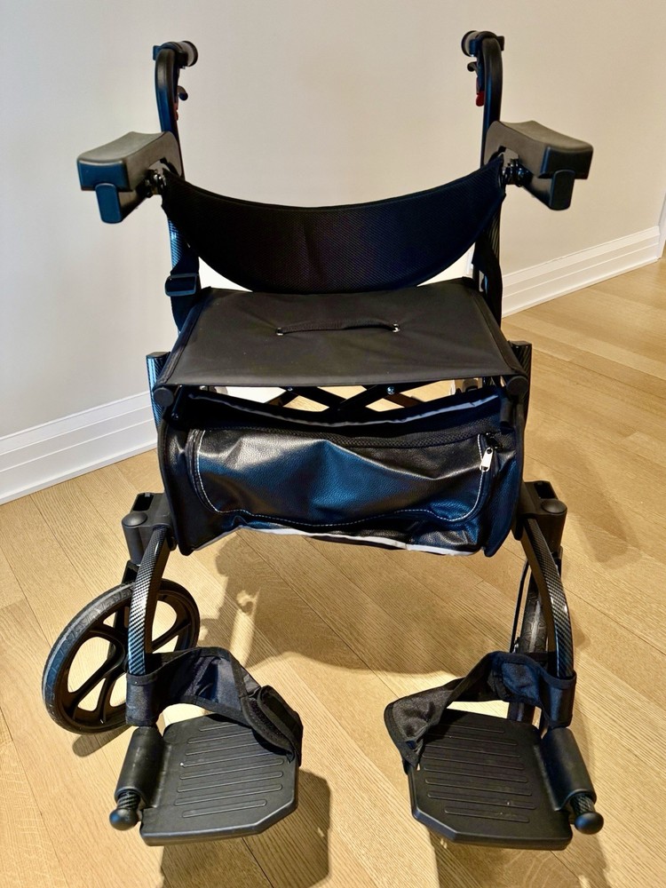 NOVA 4-Wheel Rollator Walker w/ Seat, Hand Brakes, Padded Backrest, Bag. UNUSED