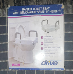 Drive Raised Toilet Seat w/ Removable Armrests 5in 300 lb White/Gray RTL12027RA