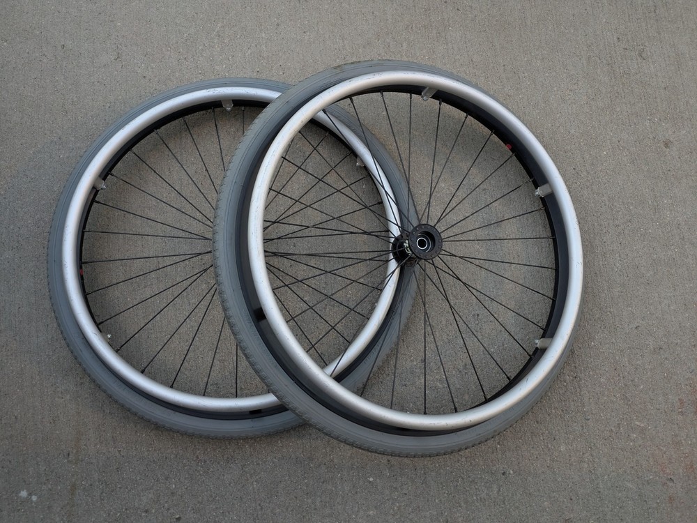 Out Front Shadow Spoke Wheelchair Wheel Pair 22″ 501mm Solid Tire Alum Handrim