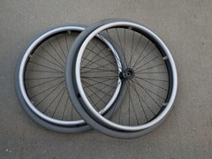 Out Front Shadow Spoke Wheelchair Wheel Pair 22″ 501mm Solid Tire Alum Handrim