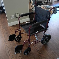Medline Transport Wheelchair with hand grip brakes for more secure handleing