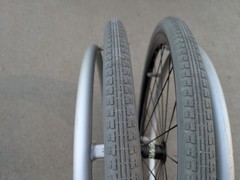 Out Front Shadow Spoke Wheelchair Wheel Pair 22″ 501mm Solid Tire Alum Handrim