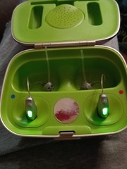 used upon delivery Phonak Hearing Aid Case – Silver, Bluetooth and hearing aids
