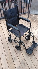 NOVA 19″ steel transport wheelchair with a 300-lb weight capacity