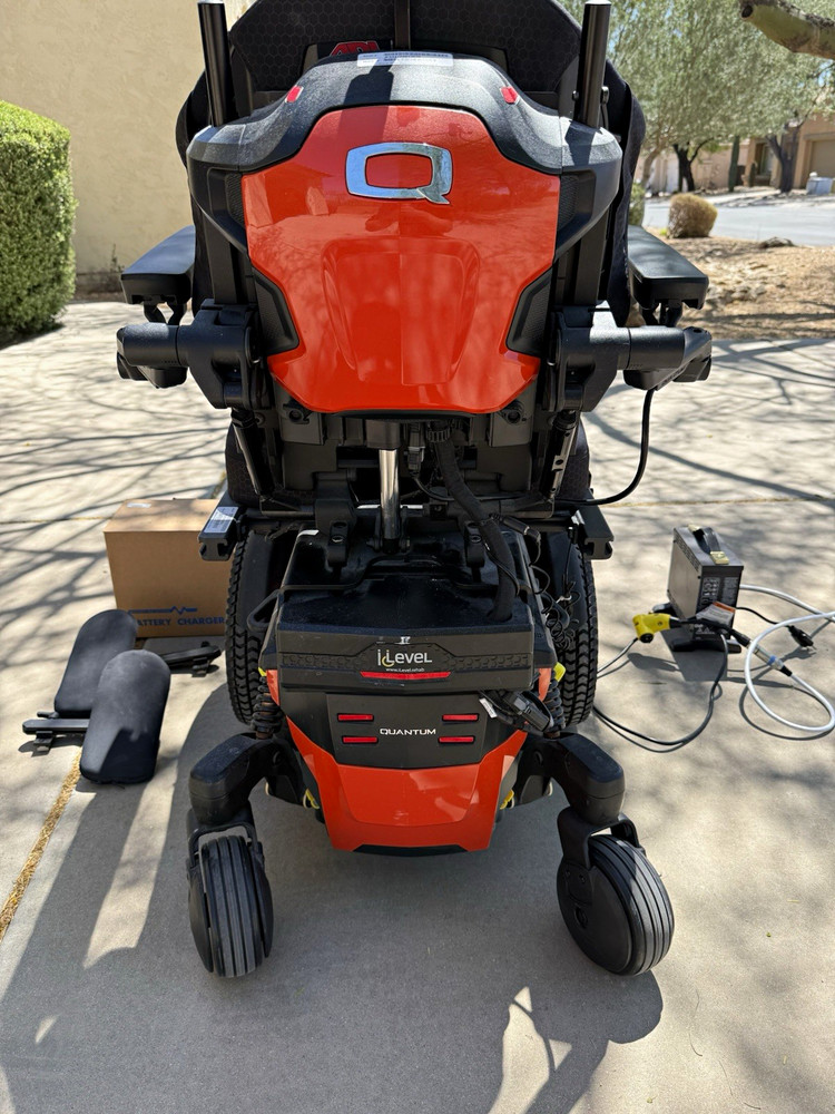 Quantum Q6 Edge 3 Stretto Power Wheelchair Orange/Black Joystick Headrest