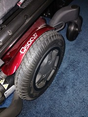 Electric wheel chair red and black Quickie Q500M promaybe has 2 hours on it