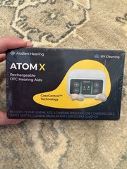 Atom X Rechargeable OTC HEARING AIDS Self cleaning Charges In Case NIB Sealed