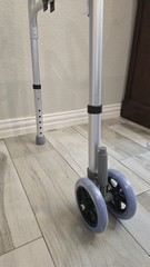 Foldable Adjustable Walking Frame with Seat, 4 Wheels, Lightweight, Silver/Black