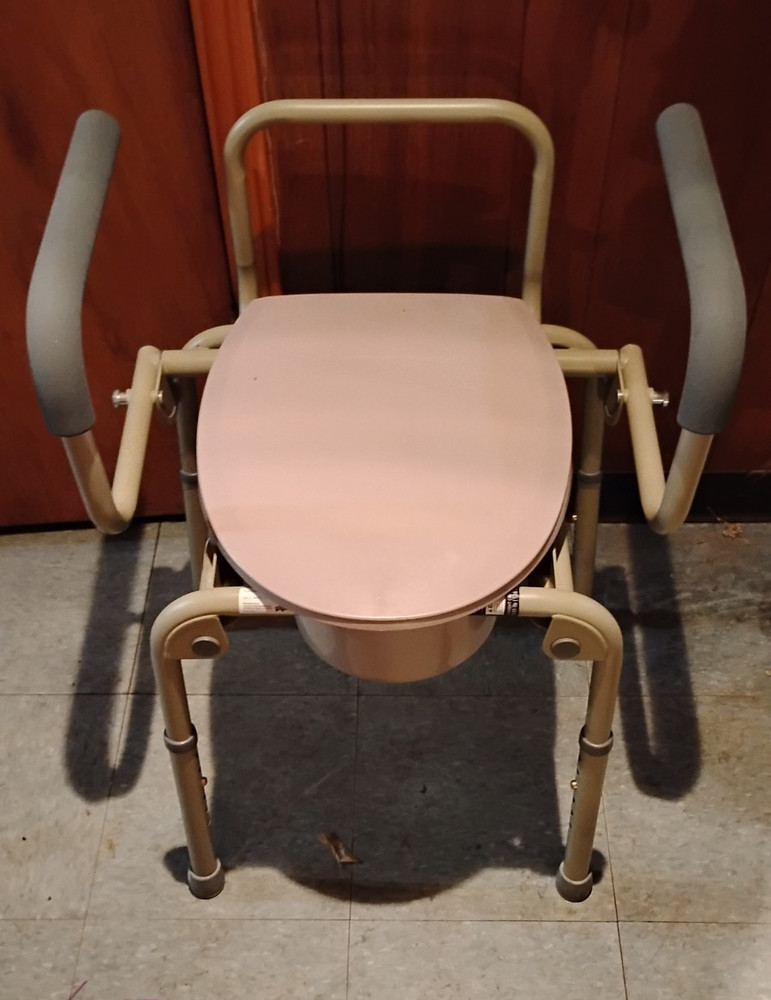 Bedside Commode Adjustable Height Plastic/Metal Beige Frame Pink Seat & Lid