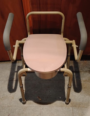 Bedside Commode Adjustable Height Plastic/Metal Beige Frame Pink Seat & Lid