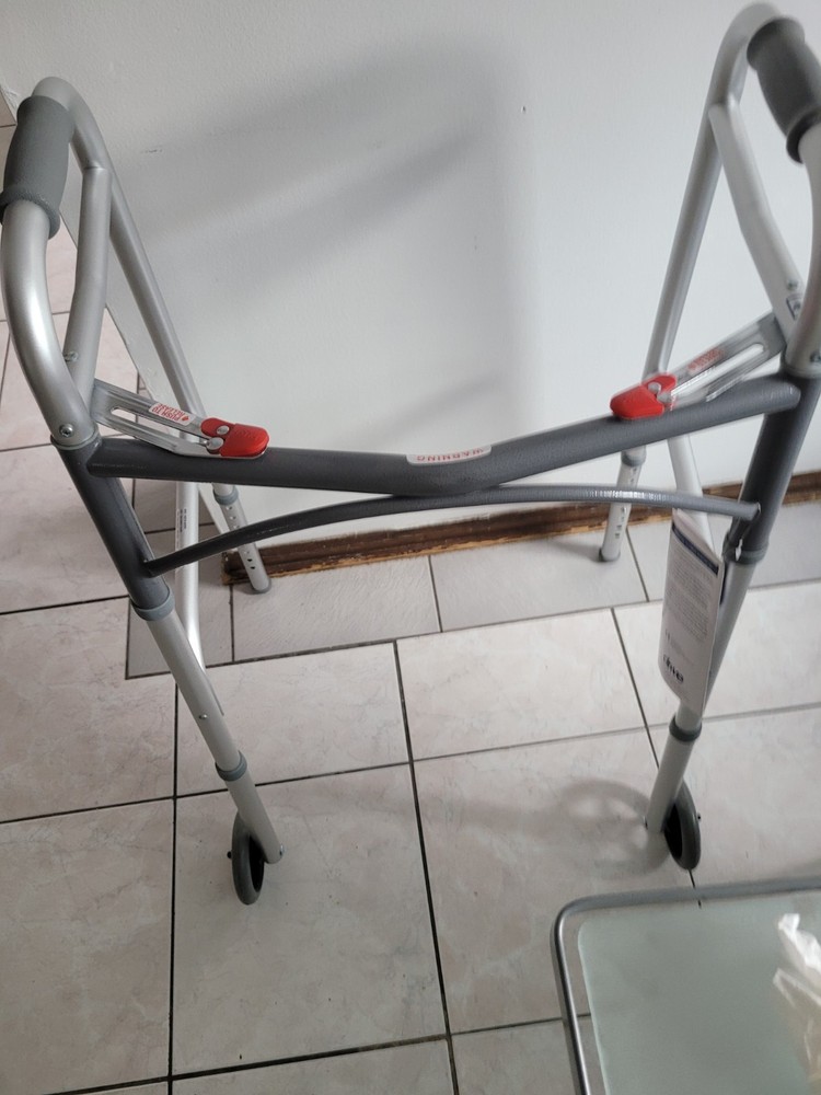 Drive 10210-4ASM Deluxe Two Button Folding Walker with 5 inch Wheels – Silver