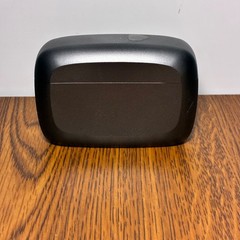 Left and Right Resound GN Hearing Aids and charging station w/cord.