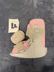 Brace Direct orthopedic fracture walking boot, featuring pink M