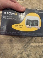 Atom X Rechargeable OTC HEARING AIDS Self cleaning Charges In Case NIB Sealed