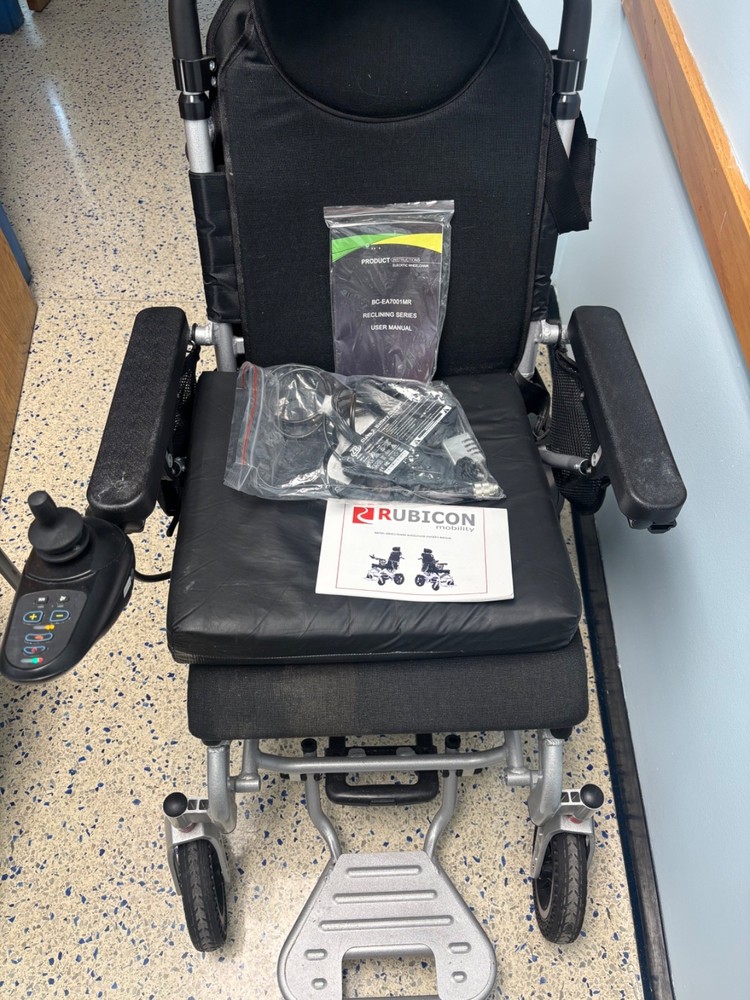 Black and silver Rubicon DX12 Deluxe premium electric wheelchair