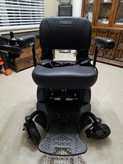 New Pride Power Travel Chair. Never Used. Indoor/outdoor.
