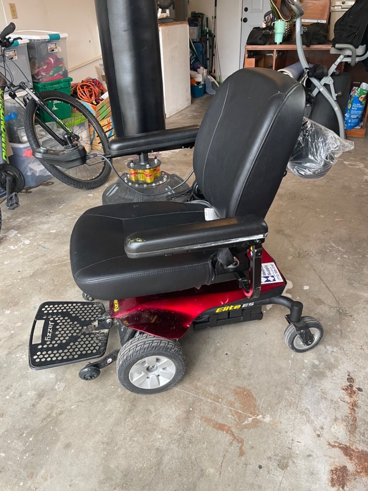 Candy Red Jazzy Select Elite ES power wheelchair with charger
