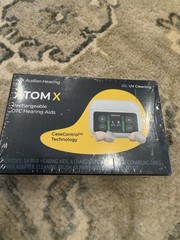 Atom X Rechargeable OTC HEARING AIDS Self cleaning Charges In Case NIB Sealed