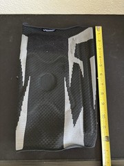 Anaconda brand knee brace featuring a black and gray textured design Size XL