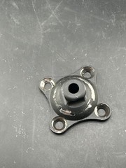 Prosthetic 4 hole male pyramid adapter component part.