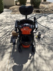 Quantum Q6 Edge 3 Stretto Power Wheelchair Orange/Black Joystick Headrest