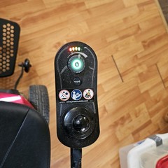 Candy Red Jazzy Select Elite ES power wheelchair with charger