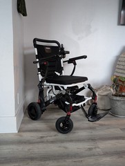 Pride Jazzy Carbon Folding Power Wheelchair, 300 lb limit/ weighs 45lbs