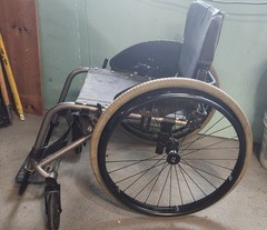 TIlite TRA Titanium wheelchair . 16″ wide x 16″ deep seat.