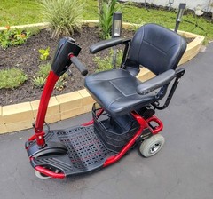 Golden Technologies 4-Wheeled Red Mobility Scooter (2) new batteries & charger