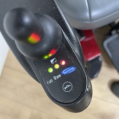 Pronto M51 Sure Step Red Power Wheelchair Joystick Adjustable Footrests