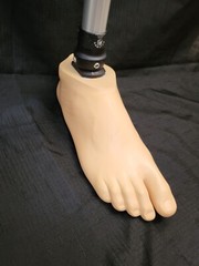 PROSTHETIC LEG, PNEUMATIC SINGLE AXIS WEIGHT-ACTIVATED LOCK KNEE, CARBON FIBER