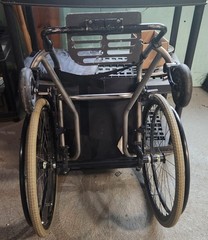 TIlite TRA Titanium wheelchair . 16″ wide x 16″ deep seat.