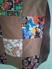 Patchwork Sports/dark brown Adult Bib, Handmade , 35 1/2” by 21 ½”, reversible