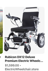 Black and silver Rubicon DX12 Deluxe premium electric wheelchair