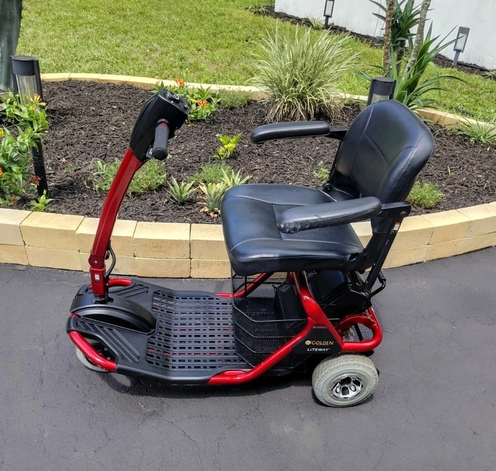 Golden Technologies 4-Wheeled Red Mobility Scooter (2) new batteries & charger