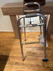 Drive 102101 Deluxe Two Button Folding Walker with 5 inch Wheels – Silver