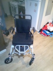 Vive mobility foldable electric wheelchair.black, used once.