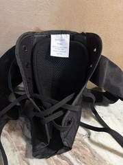 This is a black DJO LLC „Heptex“ medical ankle brace, size small.