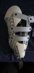 Adjustable Geometric Leg Brace for Stabilization, Beige Gray Black Plastic Foam