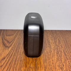 Left and Right Resound GN Hearing Aids and charging station w/cord.