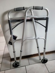 Drive 10210-4ASM Deluxe Two Button Folding Walker with 5 inch Wheels – Silver