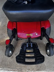 Jazzy Power Wheelchair w/ Joystick, Padded Armrests, Footrest, 4-Wheel Red/Black