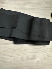 Mueller Adjustable Black Back Support Brace With Hook and Loop Closure