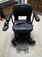 New Pride Power Travel Chair. Never Used. Indoor/outdoor.