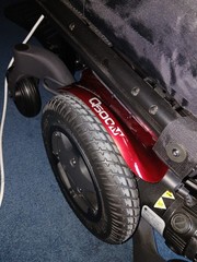 Electric wheel chair red and black Quickie Q500M promaybe has 2 hours on it