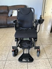 Rubicon Electric Power Wheelchair Black Foldable Joystick Adjustable Footrests