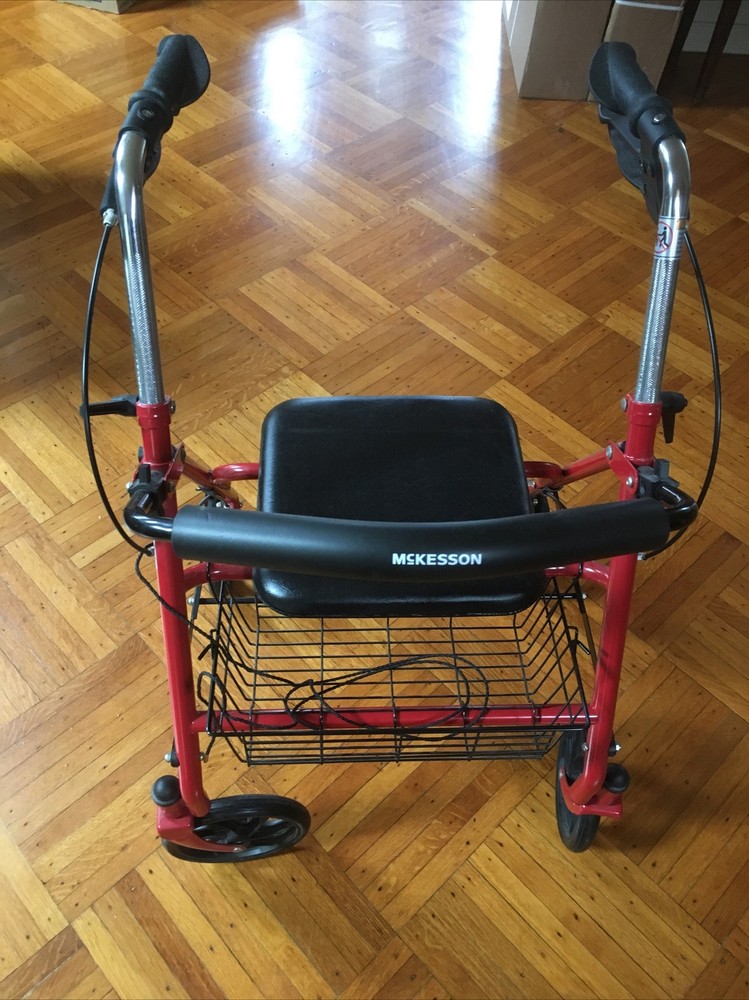MCKDS 4 Wheel Walker 31 to 37 Inch red Folding Steel 300 lbs capacity USED