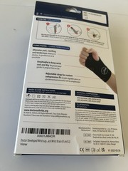 DR. ARTHRITIS COPPER LINED WRIST BRACE & HANDBOOK 1 SIZE LEFT OR RIGHT BLK