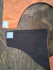 Orange and Black Adult Bib, Handmade , 35 1/2” by 21 ½”, reversible