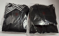 2 Black Back Braces size Medium in packages .